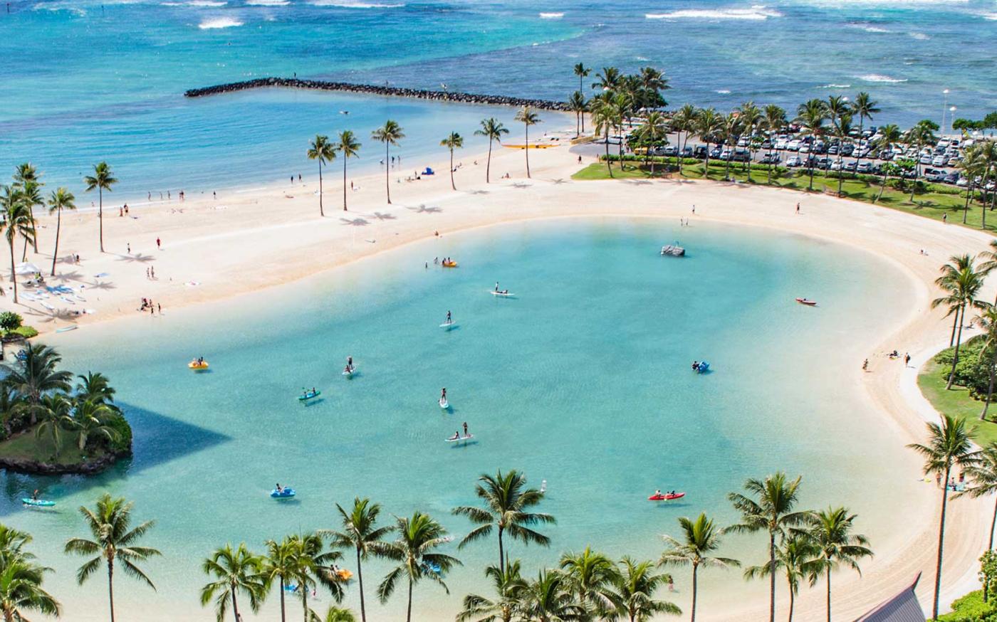 Outdoor pool next to ocean.