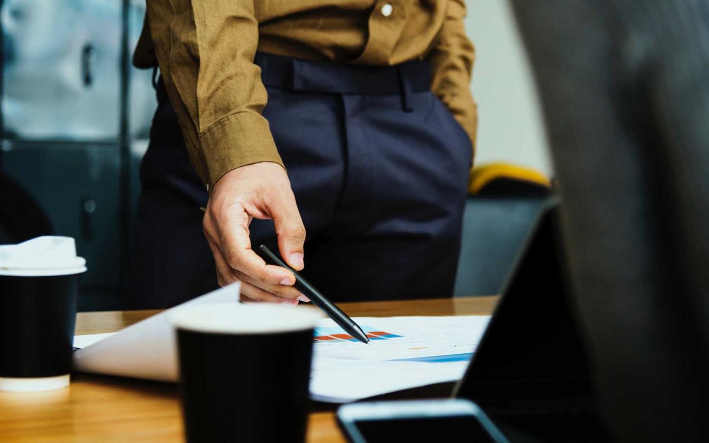 Business person standing during a meeting